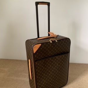 Louis Vuitton Pegase 65 rolling suitcase